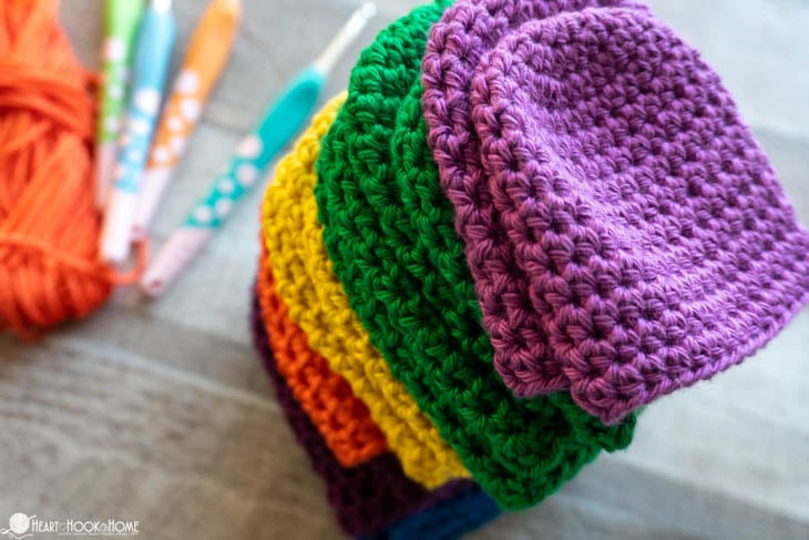 Examples of the Preemie Baby Beanie crochet pattern in multiple colors.