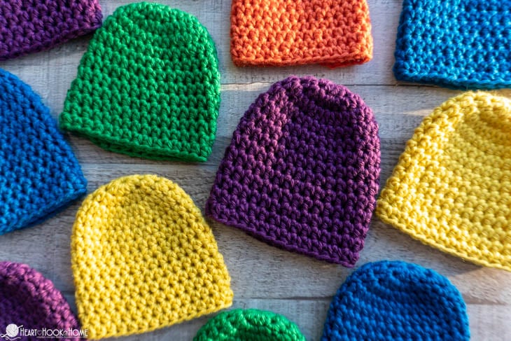 Examples of the Preemie Baby Beanie crochet pattern in multiple colors.