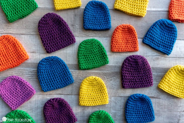 Examples of the Preemie Baby Beanie crochet pattern in multiple colors.