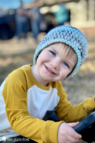 boy with blue crochet beanie