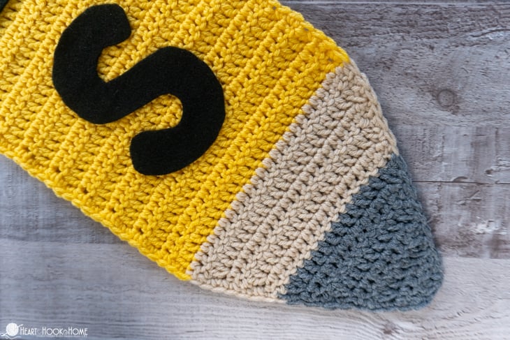 Gray, brown, yellow, and black colorways of the tip of the Pencil crochet pattern.