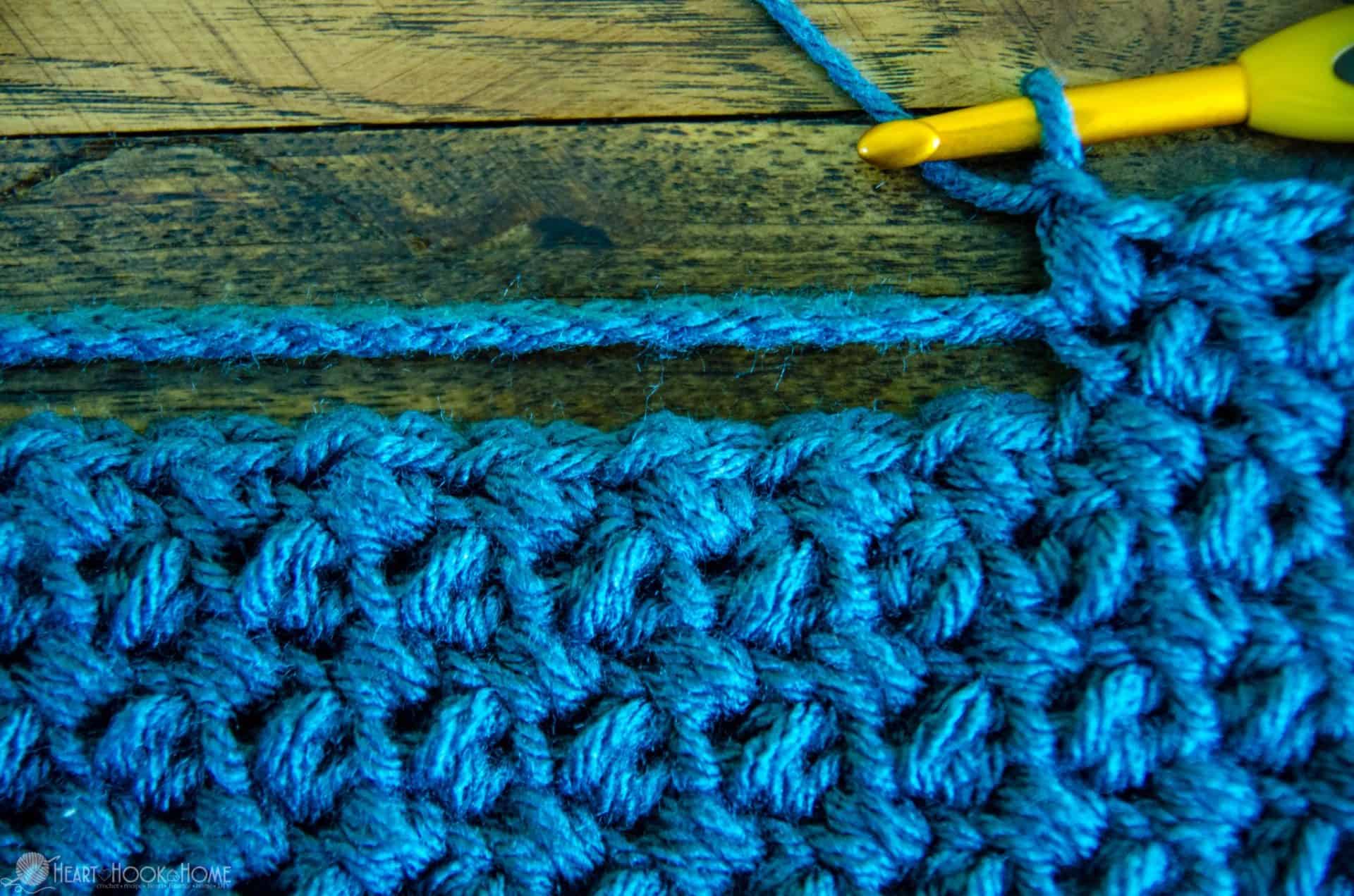 measure tape measuring out crochet stitches