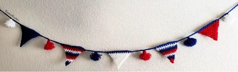 Red, white, and blue example of the Patriotic July 4th Tunisian Bunting crochet pattern.