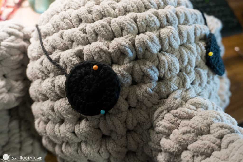 Placing eyes on elephant pillow
