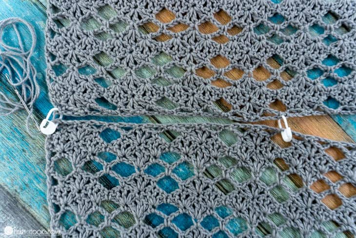 Sample of the Shell Yeah! Tunic crochet pattern in Comfy Fingering yarn in the “Whisker” colorway.