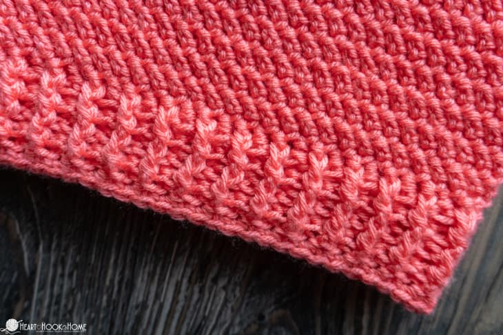 Bottom ribbing of a pink sample of the Shanti Sweater for Little Kids crochet pattern.