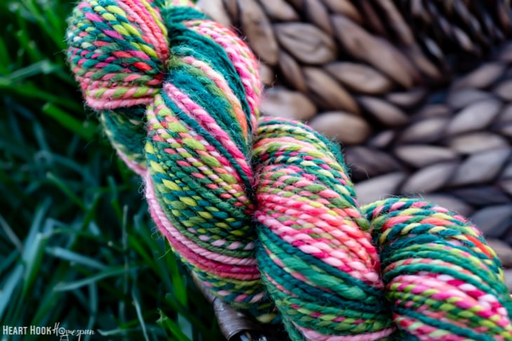 A hank of multi colored, hand spun yarn.