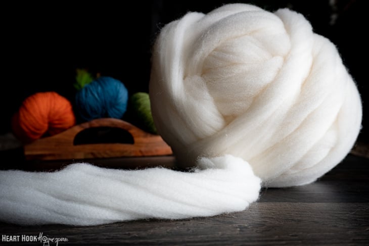 Ball of white roving yarn.