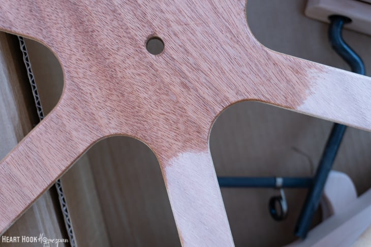 Partially stained spinning wheel.
