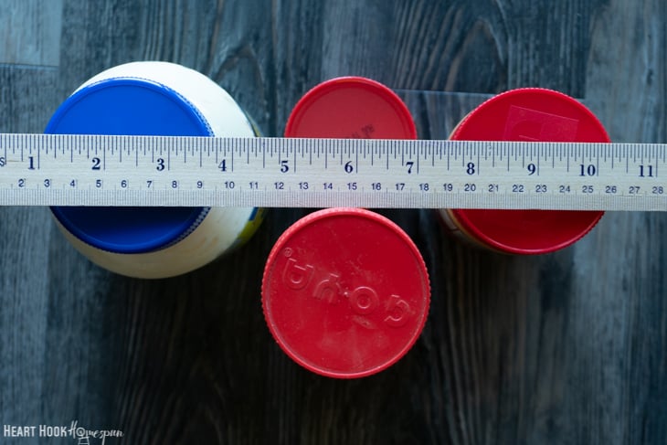Multiple pantry items with a ruler laying on top.