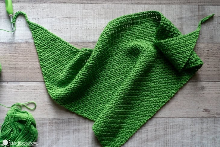 green crocheted dog bandana