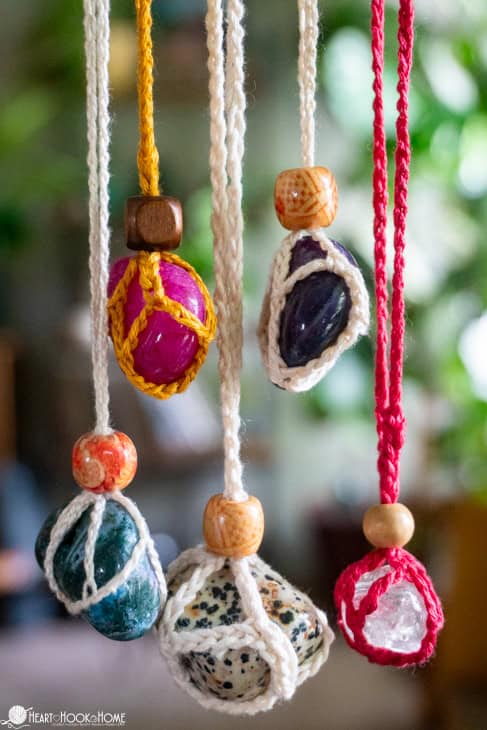 Multiple colors of stones and colorways of the Gemstone Holder crochet pattern.