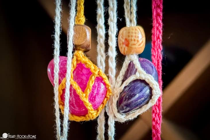 Multiple colors of stones and colorways of the Gemstone Holder crochet pattern.