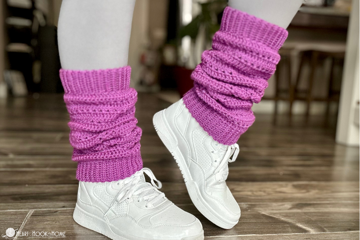 pink crocheted leg warmers with white shoes