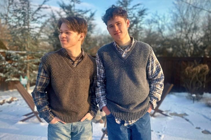 men crochet sweater vest outside with trees
