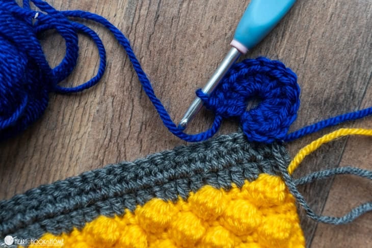 blue circle crochet stitch on twiddle muff