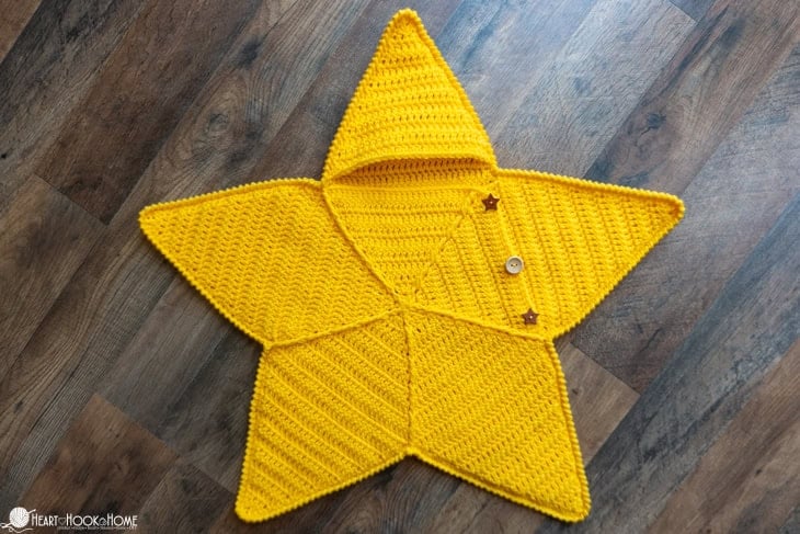 crochet yellow star sleeper with buttons