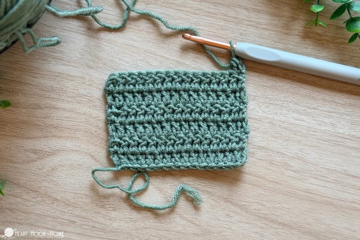 green yarn sample showing stacked single crochet