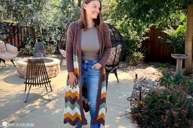 bonfire blanket cardigan in brown, green, cream, and mustard